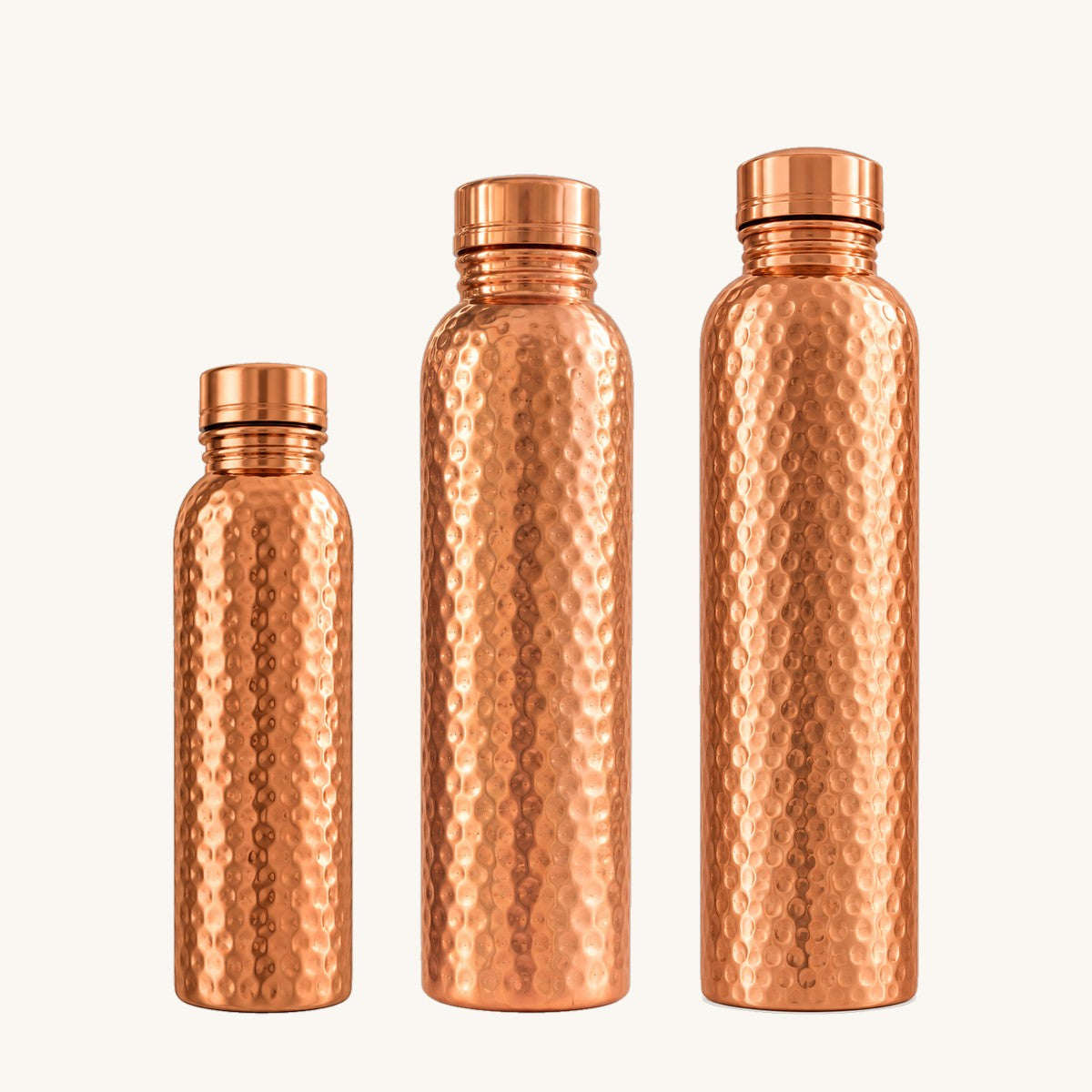 Tamra hand-hammered copper water bottles in 500ml, 750ml and 1L
